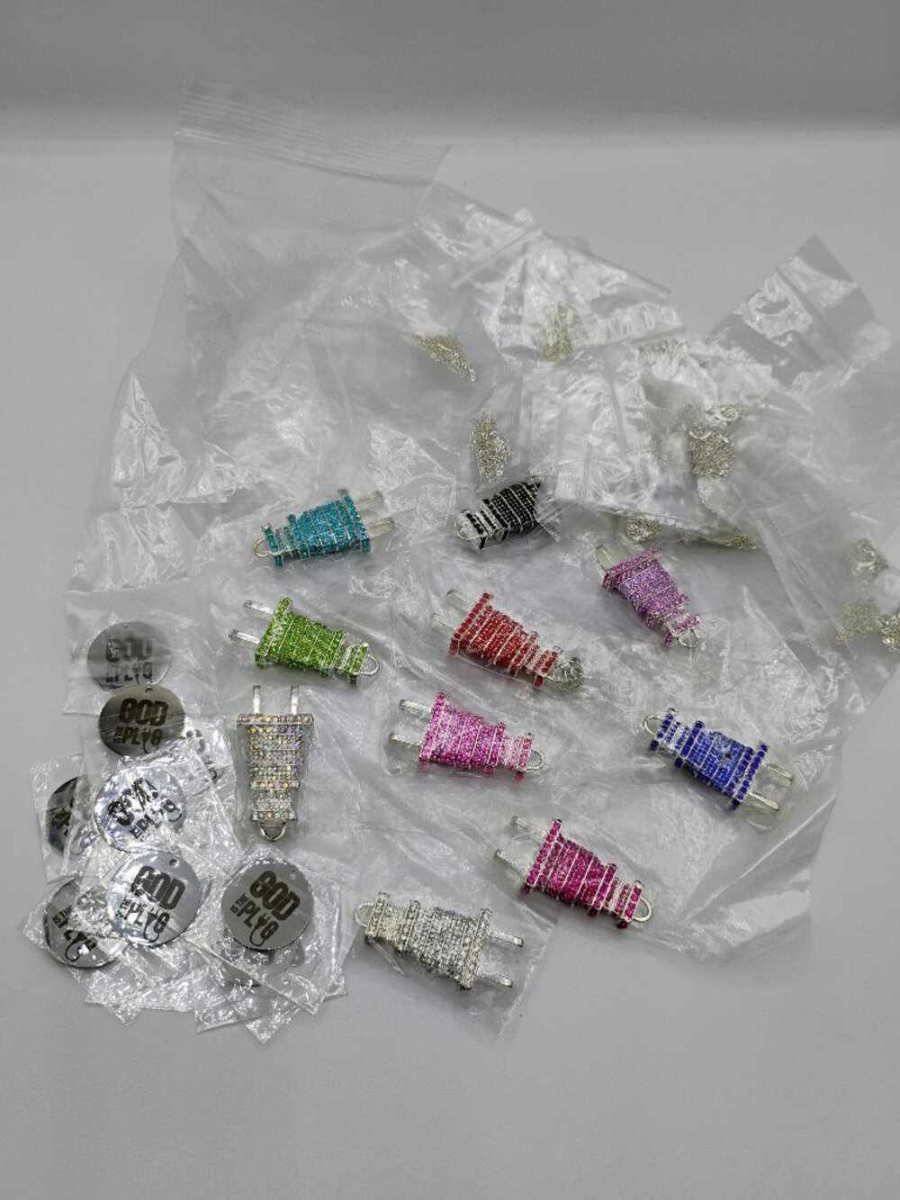Plug charms, God is the Plug charms & silver necklaces lot - 53 pieces